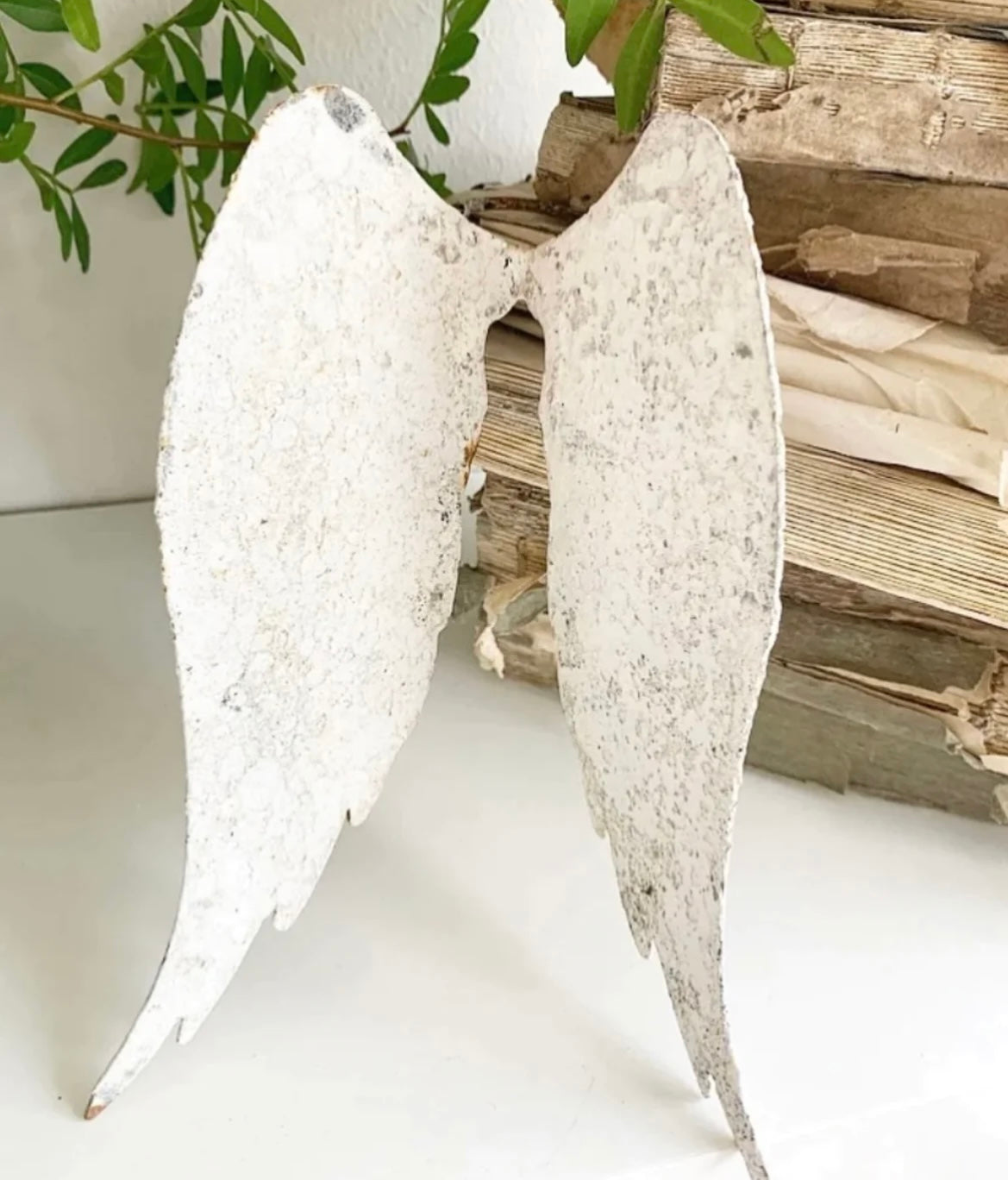 Hand crafted metal bottle wings