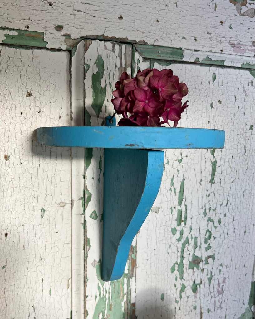 Chippy blue demi- lune shelf
