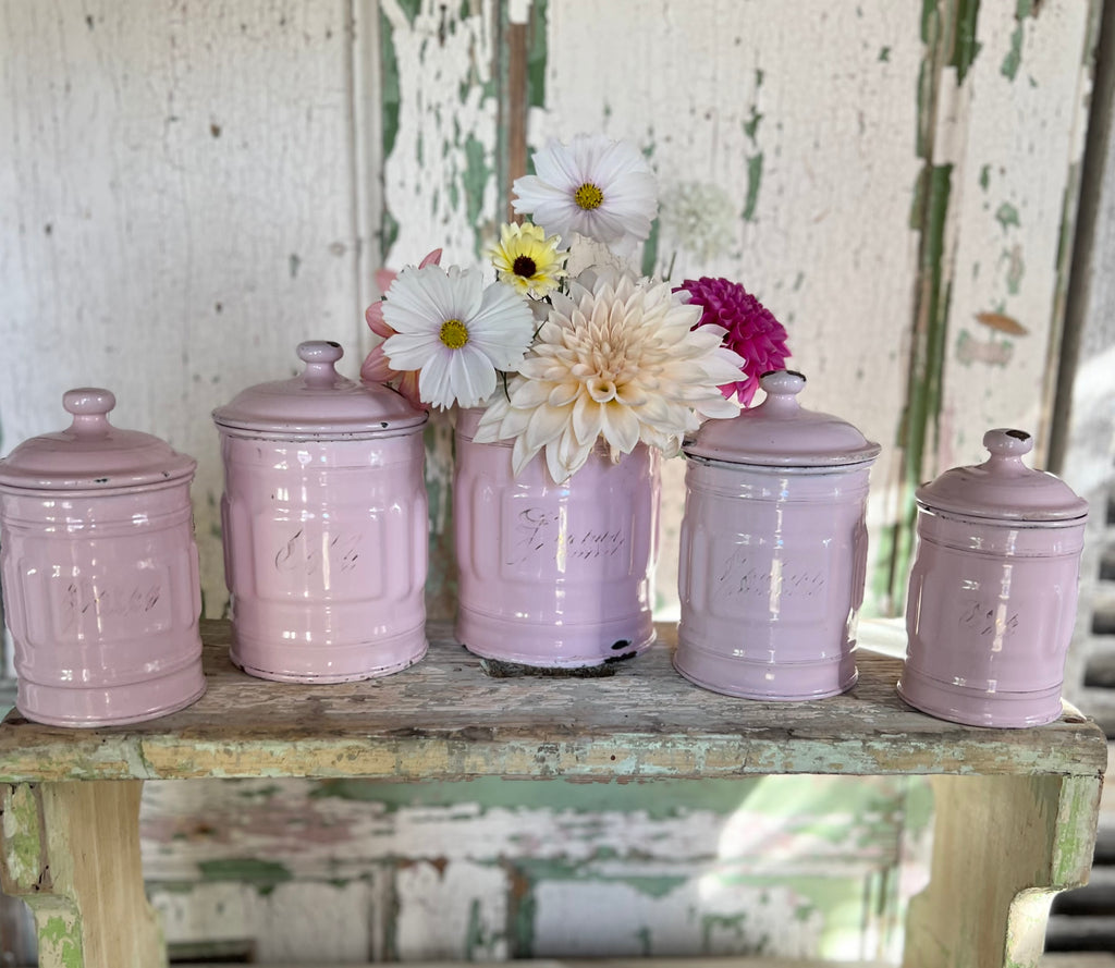 Rare set of pink enamel canisters