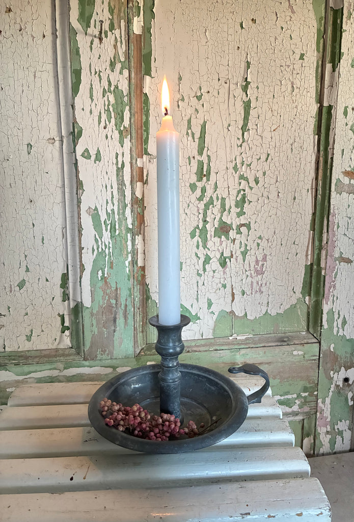 Antique pewter chamber stick