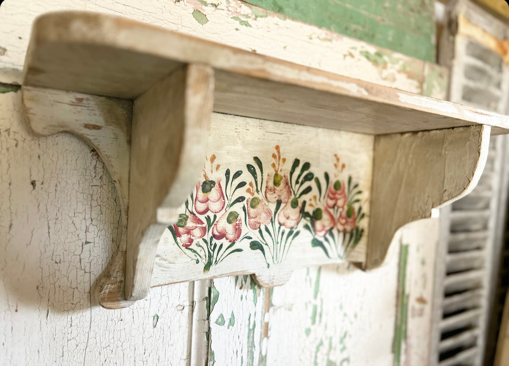 Beautiful old pine shelf with flowers